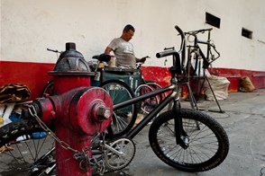 Bicycle repair shop on the street (Cali, Colombia)