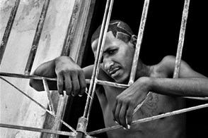 A man standing in the door (Santiago de Cuba, Cuba)