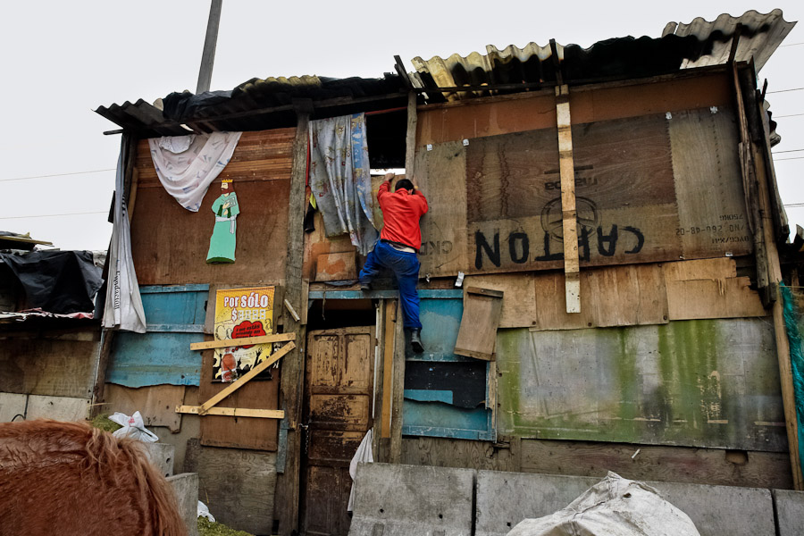 Mainly Colombia civil war fugitives live in shacks made from scrap plywood, metal, and sheets of plastic.