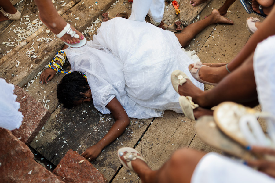 A Candomblé faithful becomes possessed during the ritual ceremony in honor to Yemanjá, the goddess of the sea, in Cachoeira, Bahia, Brazil.