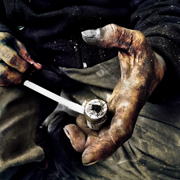 A Colombian ‘bazuco’ smoker shows an improvised pipe loaded by raw cocaine paste in Bogotá, Colombia.