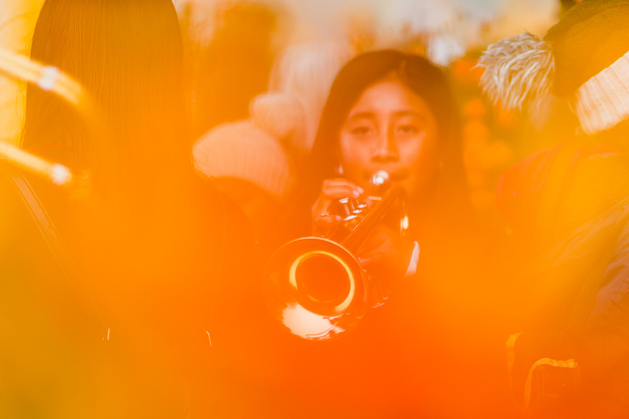 A Mexican girl plays a trumpet at a cemetery during the Day of the Dead celebrations in Ayutla, Mexico.