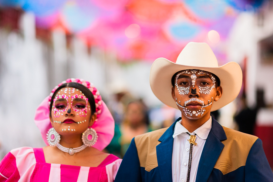 A young Mexican couple, both wearing face jewels makeup, takes part in the Day of the Dead celebrations in Taxco de Alarcón, Guerrero, Mexico.