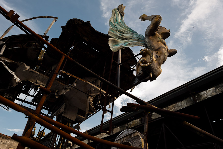 A dismantled and damaged carnival float abandoned on the work yard behind the Samba school workshops in Rio de Janeiro, Brazil.