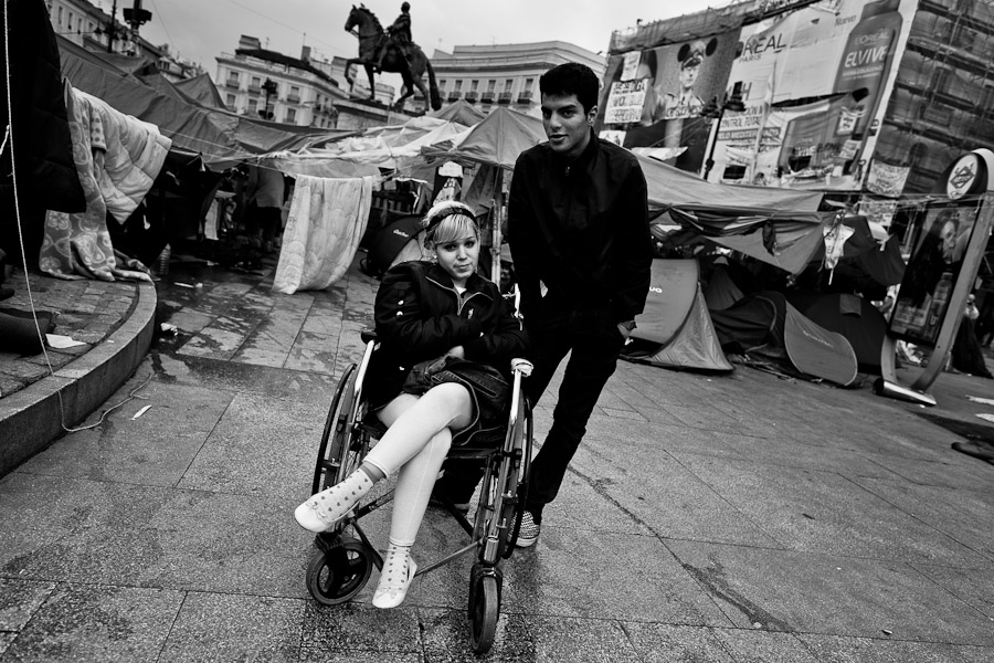 A handicapped Spanish protester (Los Indignados) camps in the tent city on Puerta del Sol square, Madrid, Spain.