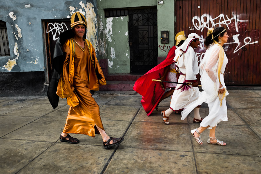 Peruvian actors, performing as Roman soldiers and citizens of Bethlehem, walk in the Good Friday procession during the Holy week in Lima, Peru.