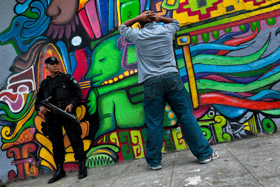 Police vs. Mara gang violence on the streets of San Salvador, El Salvador.