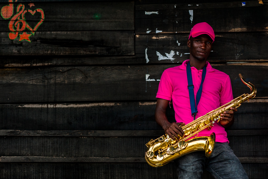 An Afro-Colombian saxophone player waits for the start of a music show during the San Pacho festival in Quibdó, Chocó, Colombia.