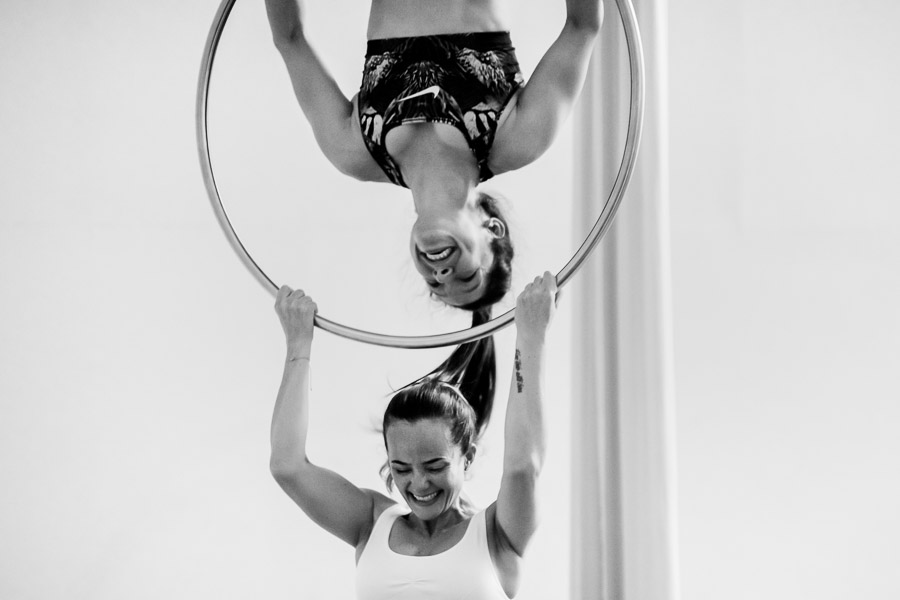 Colombian aerial dancers perform a duo act on aerial hoop during a training session in a gym in Medellín, Colombia.