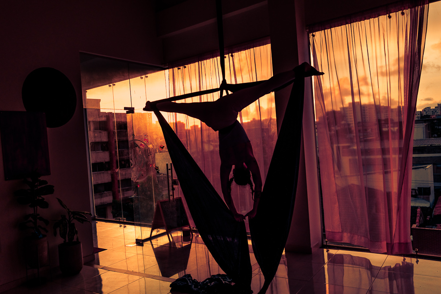 A Colombian aerial dancer performs on aerial silks during a training session in the Oshana gym in Barranquilla, Colombia.