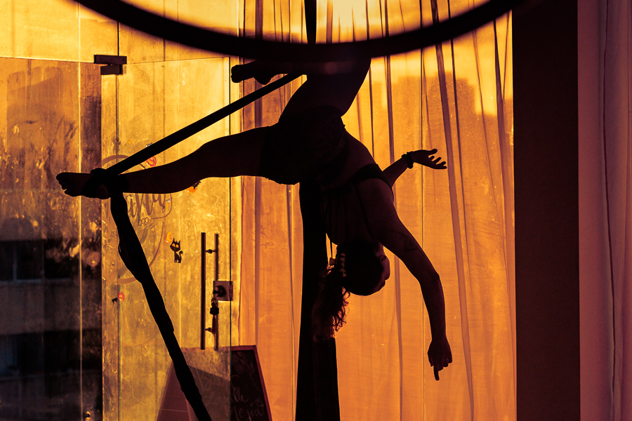 A Colombian aerial dancer performs on aerial silks during a training session in the Oshana gym in Barranquilla, Colombia.