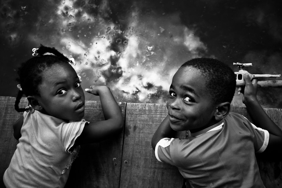 Afro-Colombian children, displaced by Colombia's internal conflict, play in a stilt house area close to Tumaco, Colombia.