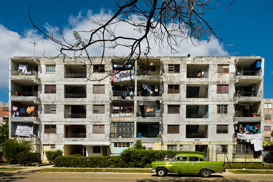 An American classic car is seen parked in front of the apartment block in Alamar, a public housing complex in the Eastern Havana, Cuba.