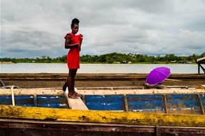 A girl on the shore of Río Atrato (Atrato river, Chocó, Colombia)