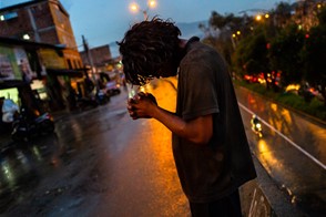 Prayer in the rain (Medellín, Colombia)