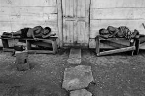 Husband and wife listen to the radio (Unión Chocó, Darién, Panama)