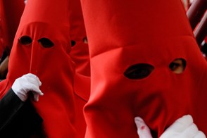 The Holy Week penitents in Spain (Malaga, Spain)