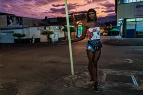 A transgender woman at twilight