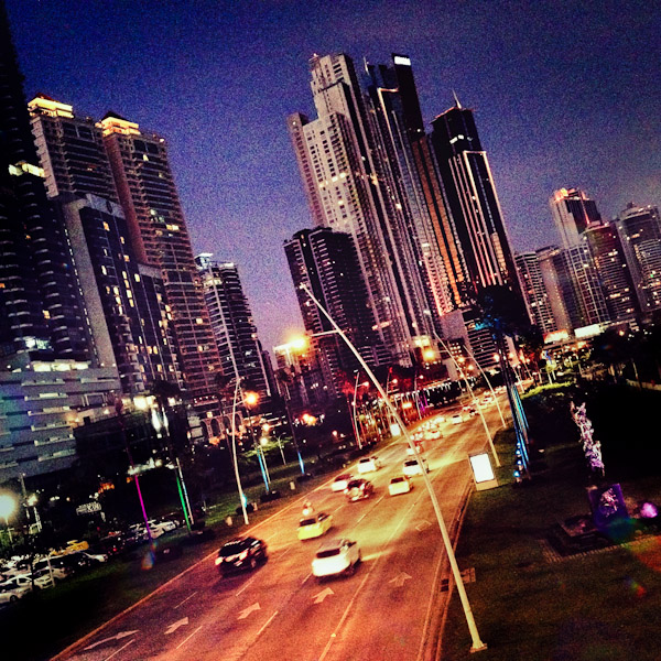Illuminated skyscrapers are seen along Avenida Balboa, a seafront highway going through the commercial and financial center of Panama City, Panama.