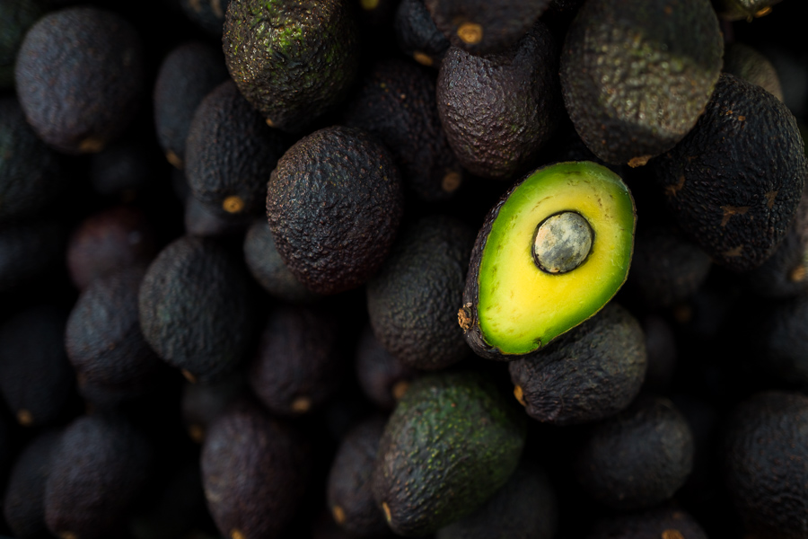 Ripe, black-purplish Hass avocados are seen offered for sale in the street of Medellín, Antioquia department, Colombia.