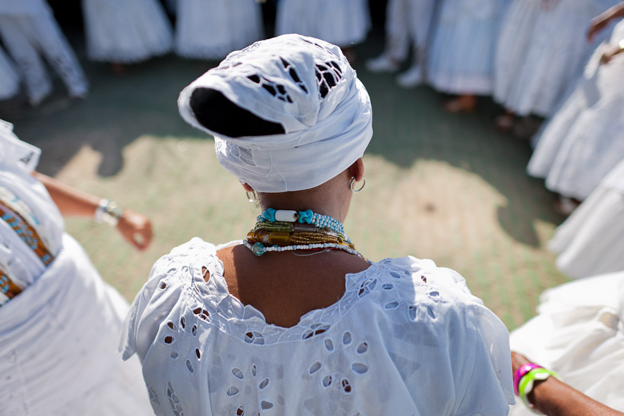 Baiana women dance in the circle before the ritual procession in honor to Yemanjá, the Candomblé goddess of the sea, in Amoreiras, Bahia, Brazil.