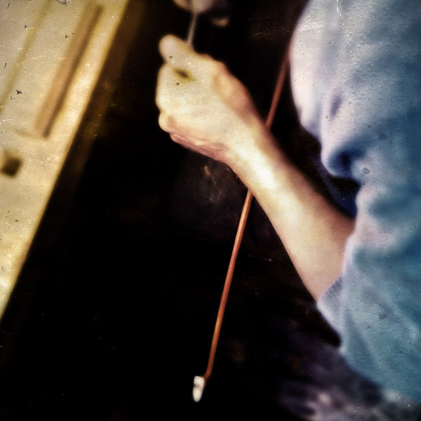 Jan Madiara, a master bow-maker, works on a bow in his workshop in Karlovy Vary, Czech Republic.