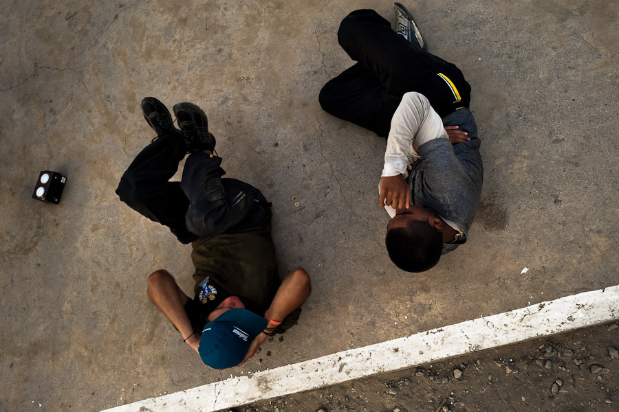 Peruvian youths exercise at the Boxeo VMT boxing club in an outdoor gym in Lima.