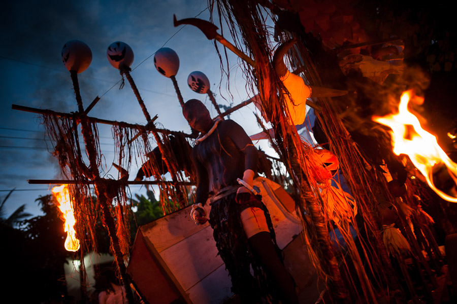 A young Salvadoran man performs a prisoner without the head carried on the mythological cart La Carreta Chillona in the La Calabiuza parade at the Day of the Dead festivity in Tonacatepeque, El Salvador.