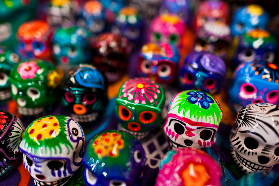 Colorful painted skulls (Calaveras) are sold on the market during the Day of the Dead celebration in Mexico City, Mexico.
