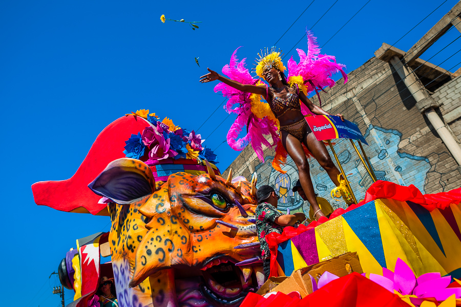 An Afro-Colombian beauty queen performs atop a float during the Batalla de Flores, the major parade of the Carnival in Barranquilla, Colombia.