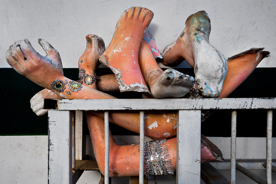 Arms and legs of the carnival statues thrown into a pile in the Samba school warehouse in Rio de Janeiro, Brazil.