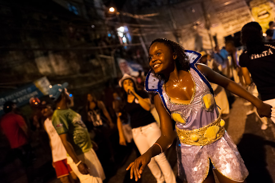 A Brazilian dancer performs during the Carnival parade in the favela of Rocinha, Rio de Janeiro, Brazil.