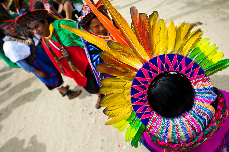 Natives of the Kamentsá and Inga tribes, wearing colorful headgears, take part in the Carnival of Forgiveness, a traditional indigenous celebration in Sibundoy, Colombia.