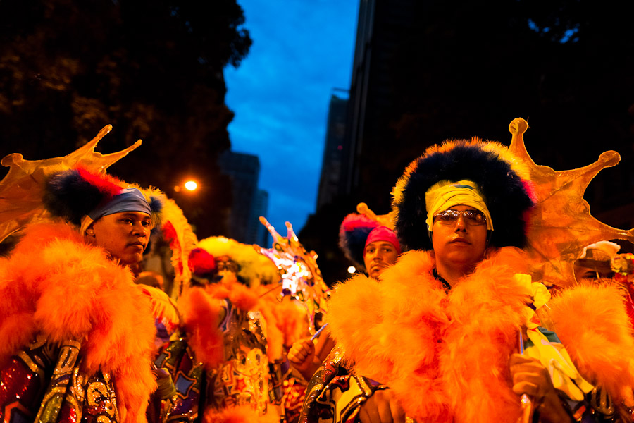 Brazilian men, dressed in fancy costumes, perform during the carnival street party in Rio de Janeiro, Brazil.