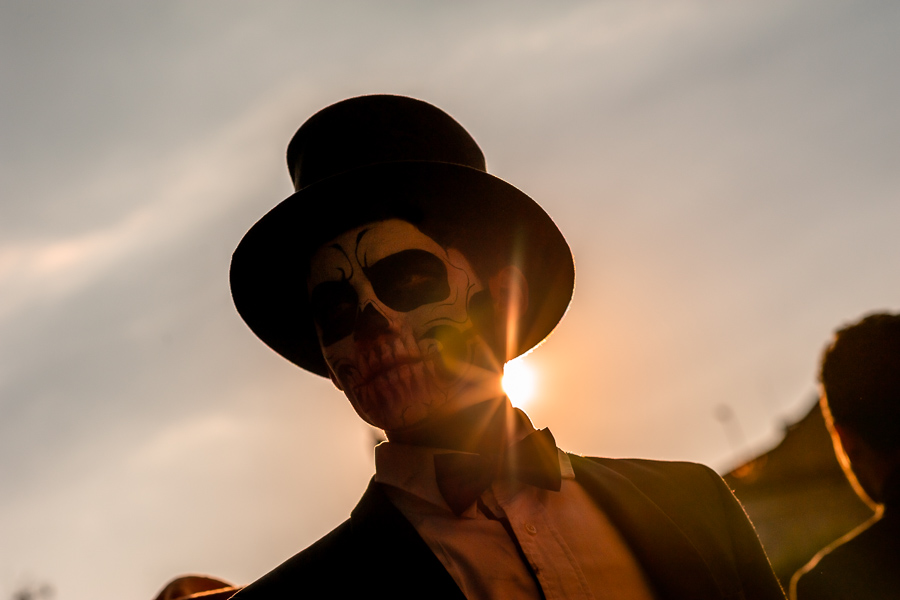 A young Mexican man, dressed as Catrín, a Mexican pop culture character representing the Death, takes part in the Day of the Dead festivities in Morelia, Michoacán, Mexico.