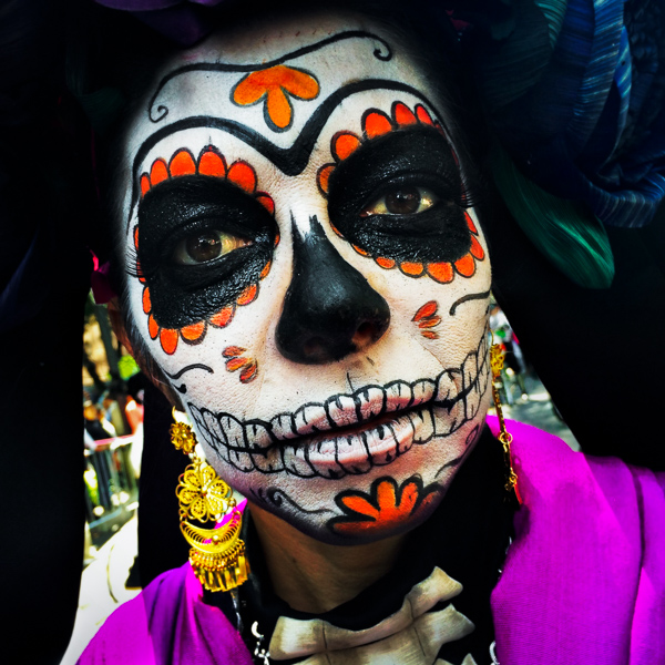 A young girl, representing a Mexican cultural icon called La Catrina, takes a part in celebrations of the Day of the Dead (Día de Muertos) in Mexico City, Mexico.