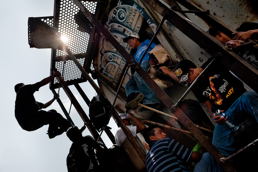 Central American immigrants, heading the southern U.S. border, climb up the cargo train known as ‘La Bestia’ (The Beast) on a train station in Arriaga, Mexico.