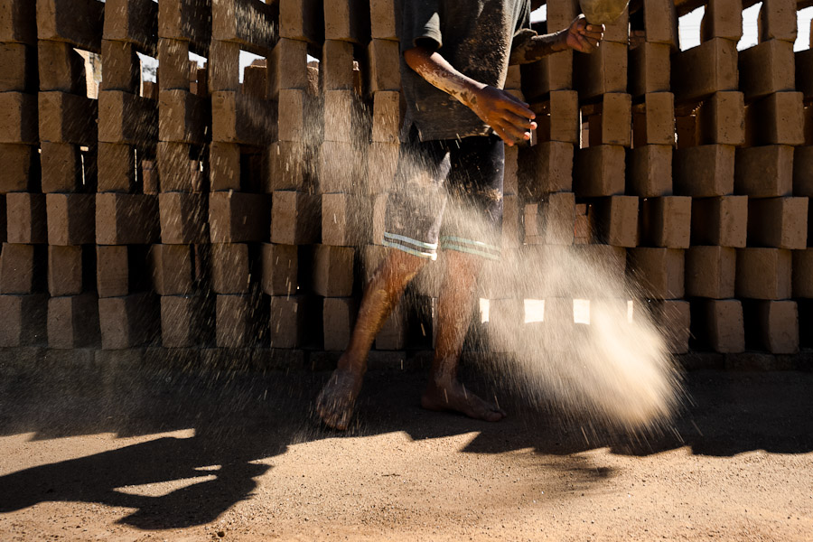 Child workers work at a brick factory in Istahua, El Salvador.