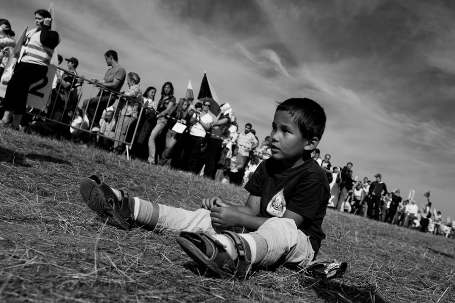 A Czech child watches the catholic liturgy served by the Pope Benedict XVI at the meadow in Stara Boleslav, one of the main pilgrimage site of the Czech Republic.