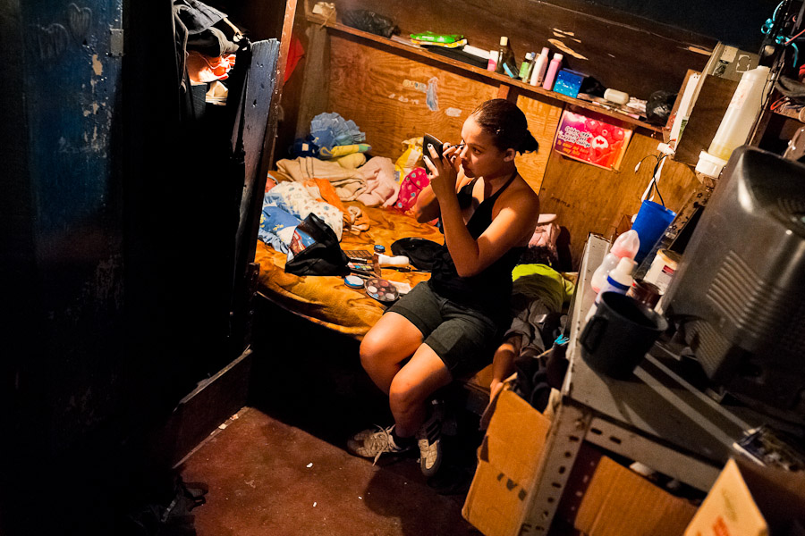 Bianca Rocio, a Salvadorean dancer, applies makeup in her trailer before a dancing performance at the Circo Brasilia, a family run circus travelling in Central America.