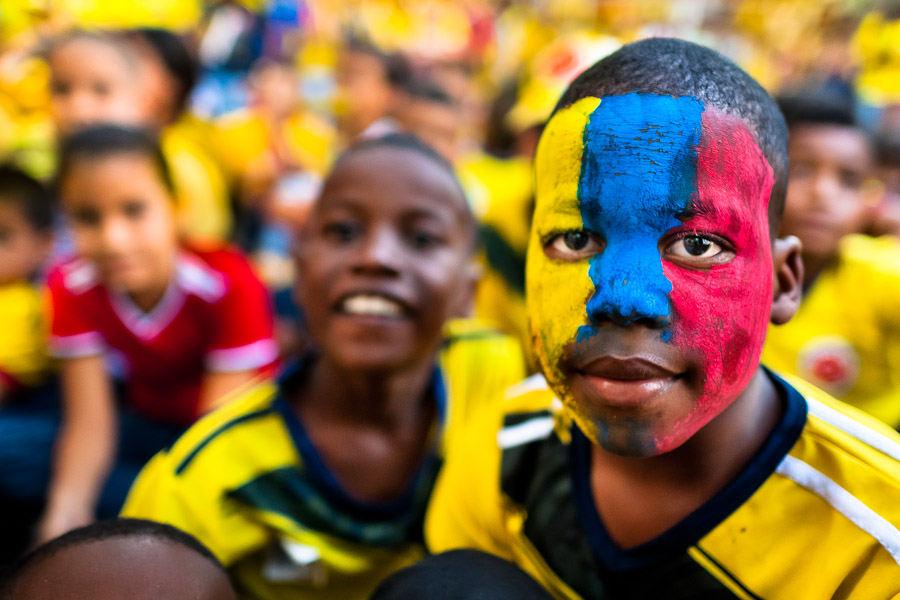 Colombia football fans watch the match between Colombia and Uruguay at the FIFA World Cup in Brazil.