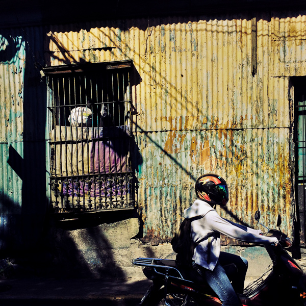 Spanish colonial architecture elements seen in contemporary housing in working class neighborhoods of San Salvador, El Salvador.