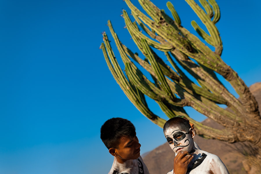 A Cora Indian boy prepares himself for the religious ritual ceremony of Semana Santa (Holy Week) in Jesús María, Nayarit, Mexico.