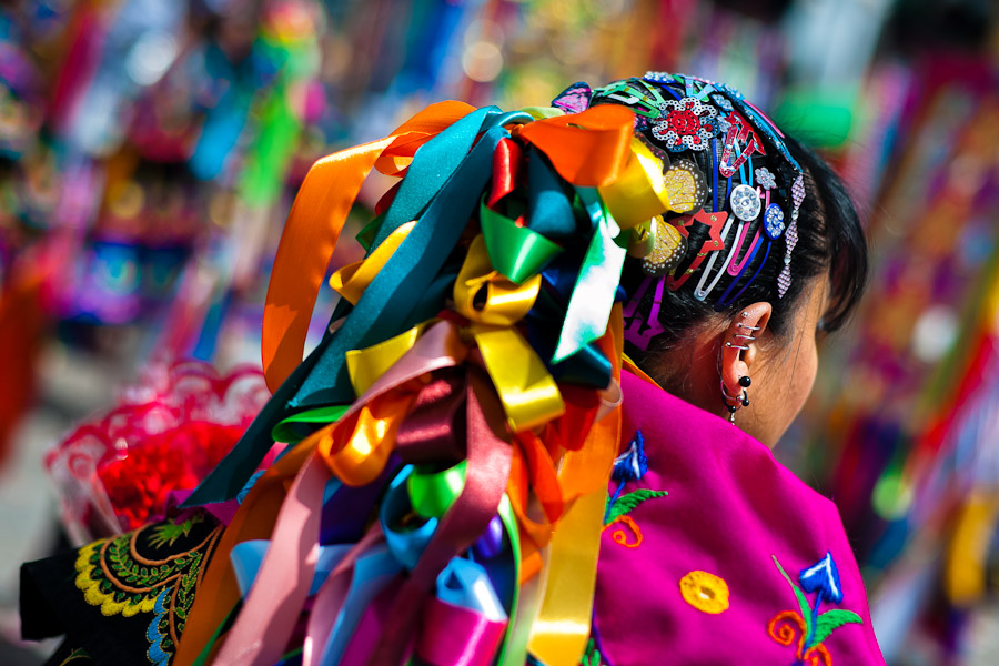 Girl dancers (danzantes) take part in the religious parade within the Corpus Christi festival in Pujilí, Ecuador.