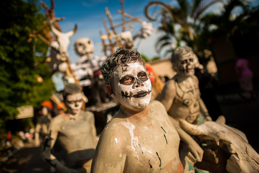 Young Salvadoran men perform indigenous mythology characters in the La Calabiuza parade at the Day of the Dead celebration in Tonacatepeque, El Salvador.