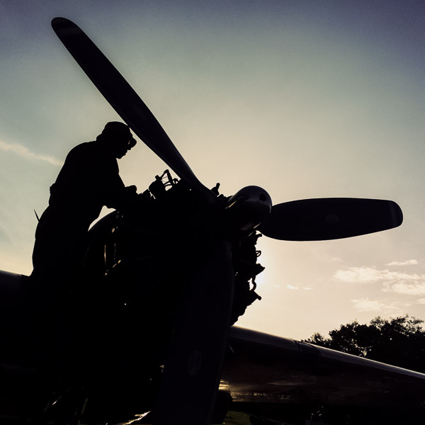 A Colombian mechanic repairs a propeller-driven engine of a Douglas DC-3 aircraft during the maintenance at the airport of Villavicencio, Colombia.