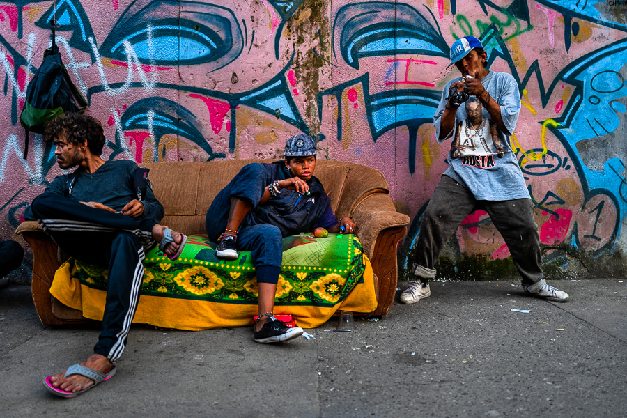 Young Colombian drug addicts smoke “basuco” in the street of “El Bronx”, a drug distribution area in the center of Medellín, Colombia.