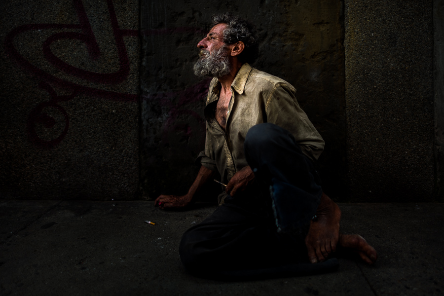 A Colombian man is seen during a heavy drug intoxication after having smoked a pipe of “bazuco” (a raw cocaine paste) in Medellín, Colombia.