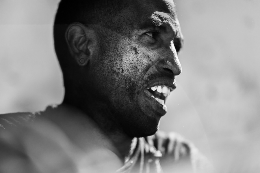 Daniel R., an economic migrant from Venezuela, works as a charcoal carrier in a street market in Cartagena, Colombia.