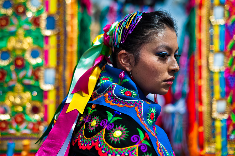 A girl dancer (danzante) takes part in the religious parade within the Corpus Christi festival in Pujilí, Ecuador.